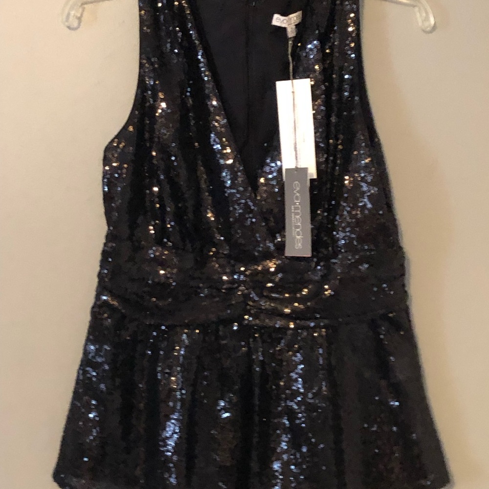 NWT sequined peplum top.